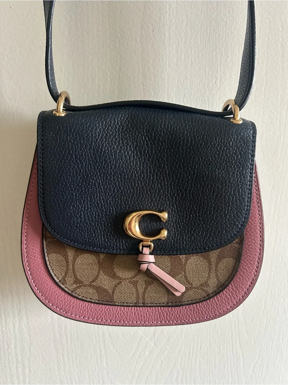 Coach Signature Remi Saddle Crossbody in navy blue and pink, classic coach